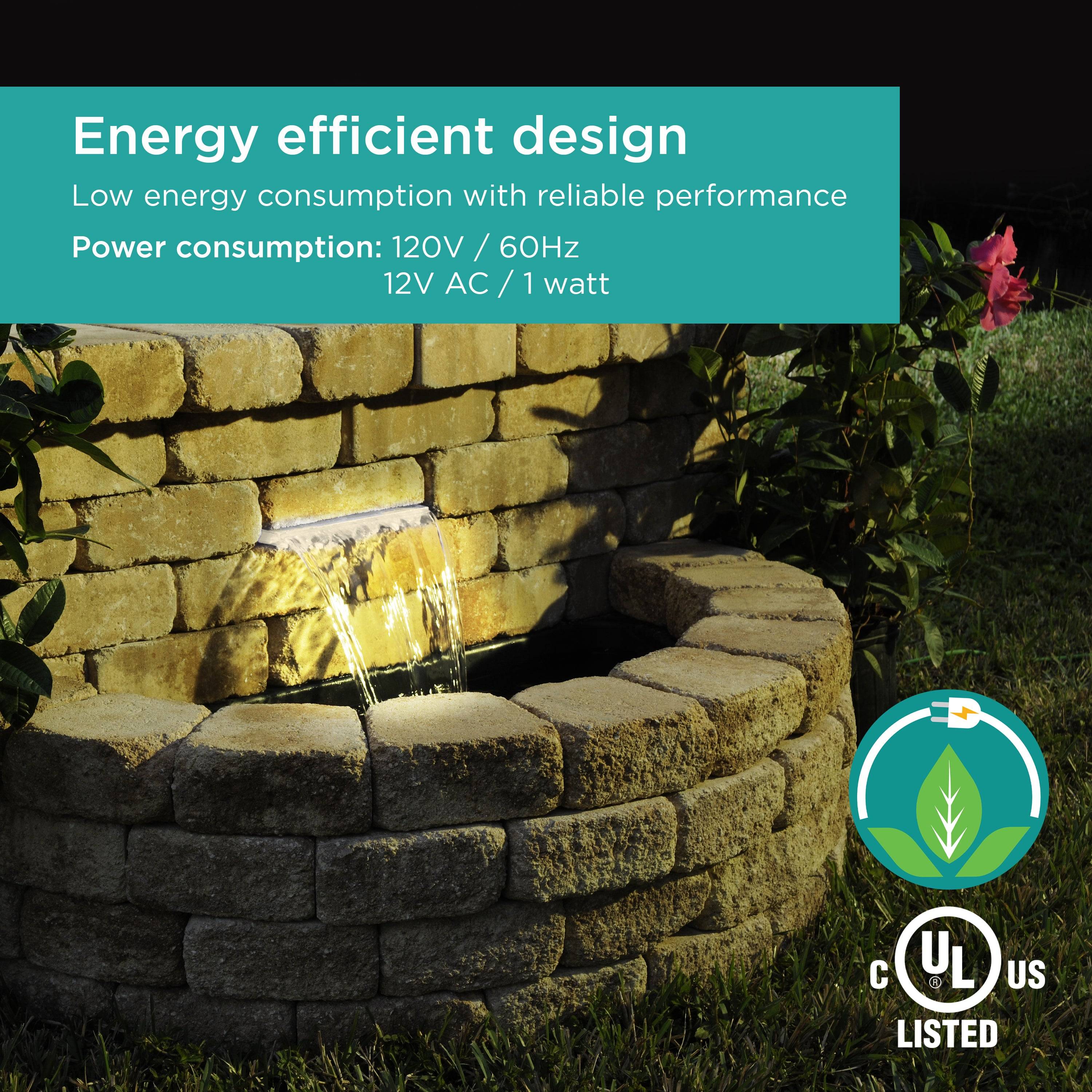 Energy efficient Waterfall Spillway with lights shining at night