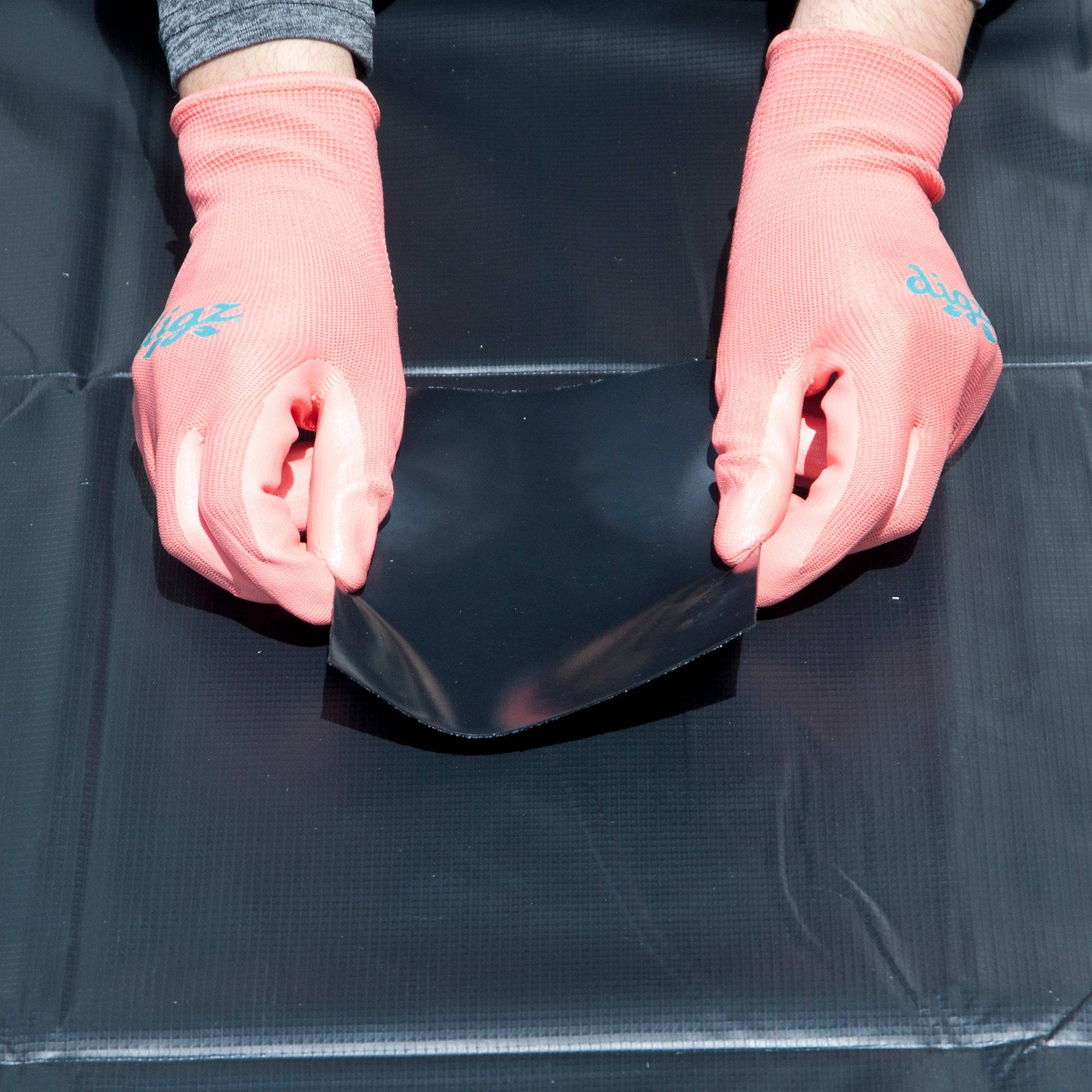 Hands placing the Liner Patch piece onto a PVC liner
