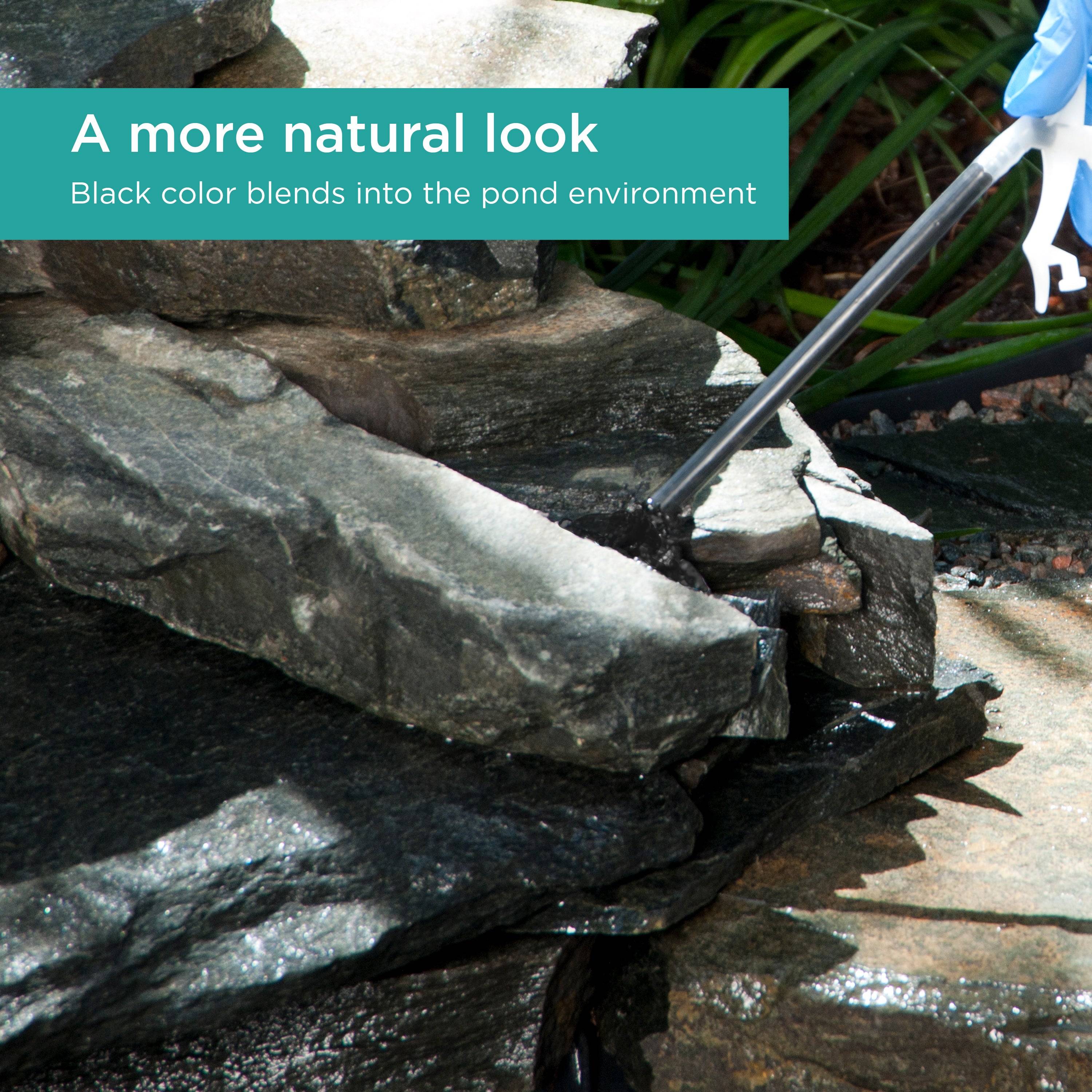 Waterfall Foam Sealant being applied in-between rocks in a waterfall spillway 